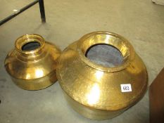 A brass spitoon and a smaller example