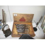 A boxed set of engineering tools including tapping set