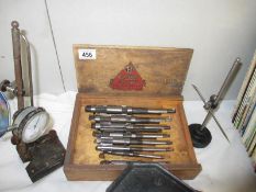 A boxed set of engineering tools including tapping set