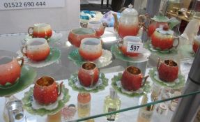 A fine tea set shaped as Strawberries
