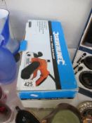 A boxed silverline Bell Sander