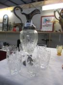 A vintage glass and silverplate carafe and 6 crystal glasses