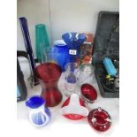 A collection of coloured glassware