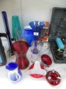 A collection of coloured glassware