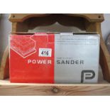 A boxed power sander