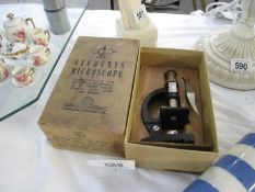 A boxed Student Microscope