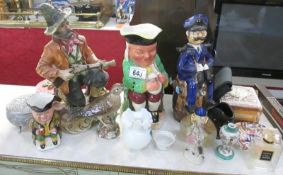 A shelf of pottery,