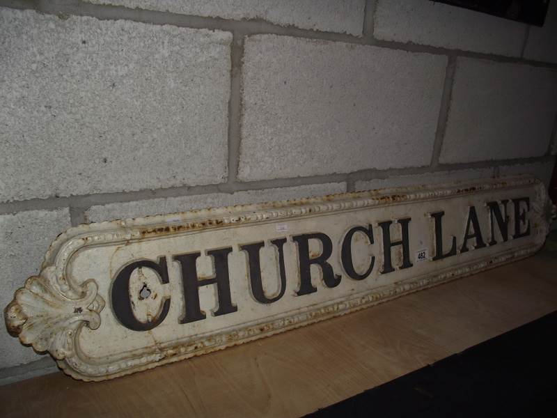 An original cast iron 'Church Lane' street sign.