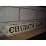 An original cast iron 'Church Lane' street sign.