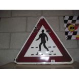 An enamel crossing warning triangle road sign.