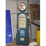 A model of a petrol pump clock cabinet.
