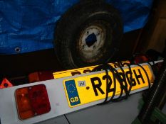 2 trailer light boards and an 8" trailer wheel.