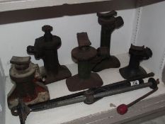 5 vintage bottle jacks and one other.