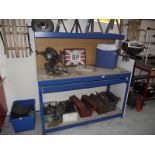 A metal framed work bench.