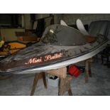 A 1970's Apollo mini bullet speedboat with outboard motor, water ski's etc.