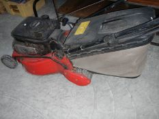 A Briggs & Stratton ES45 petrol lawn mower.