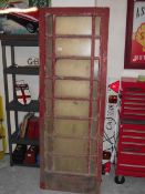 A K6 red telephone box door.