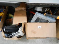 2 boxes of miscellaneous tools including clamps, drill bits, sandpaper, hose, wire etc.