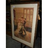 A large framed and glazed print of an Edwardian lady on bicycle.