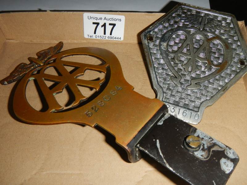 An early flat brass AA car badge and an AA commercial vehicle car badge.