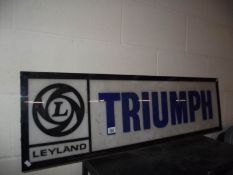 A large 1970's Leyland Triumph plastic dealer light board sign panel, a/f.