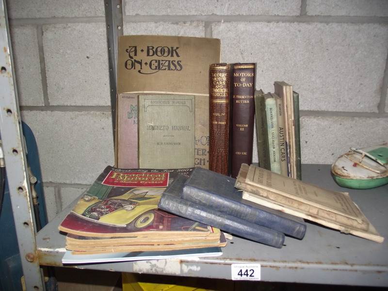 A quantity of old motoring and car handbooks including Morris, Wolseley etc.