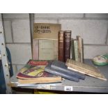 A quantity of old motoring and car handbooks including Morris, Wolseley etc.