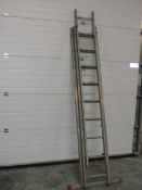 A triple extending aluminium ladder.