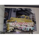 A large print on canvas of a New York yellow taxi cab and one other.