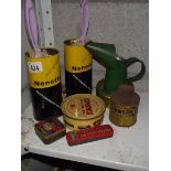 A vintage Dunlop tyre and rim paint tin and other tins.
