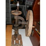 A vintage pedestal drill stand.