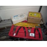 A boxed piston ring compressor, 4 piece circlip pliers set etc.