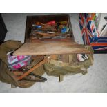 A wooden box and 2 canvas bags of spanners and other tools.