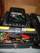 3 tool boxes with contents and a torque wrench.