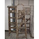 3 wooden step ladders.