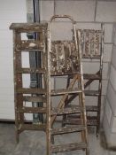 3 wooden step ladders.