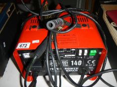 A Sealey Superboost 140 starter battery charger.