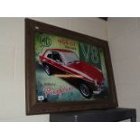A retro MGB GT V8 metal sign in an old wooden frame.