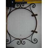 A large wrought iron pub/hotel outside hanging sign frame.