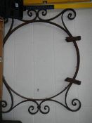 A large wrought iron pub/hotel outside hanging sign frame.