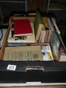 A box of motoring books including road racing etc.
