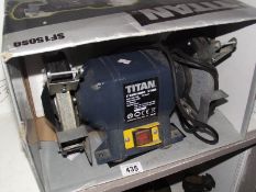 A Tital 6" bench grinder.