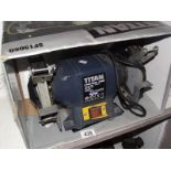 A Tital 6" bench grinder.