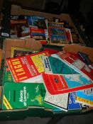 2 boxes of maps and tourist guides.