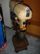 A FOBCO industrial pedestal drill.