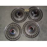 A set of 4 13" Ford Capri wheel trim hub caps.