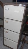 A metal filing cabinet.