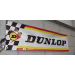 A retro Dunlop advertising banner.