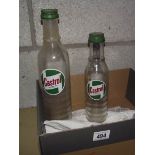 2 glass Castrol XL and XXL oil bottles.