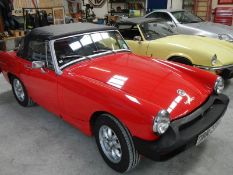 A 1976 MG Midget 1500, MOT exempt, last MOT expired 14/04/2019.